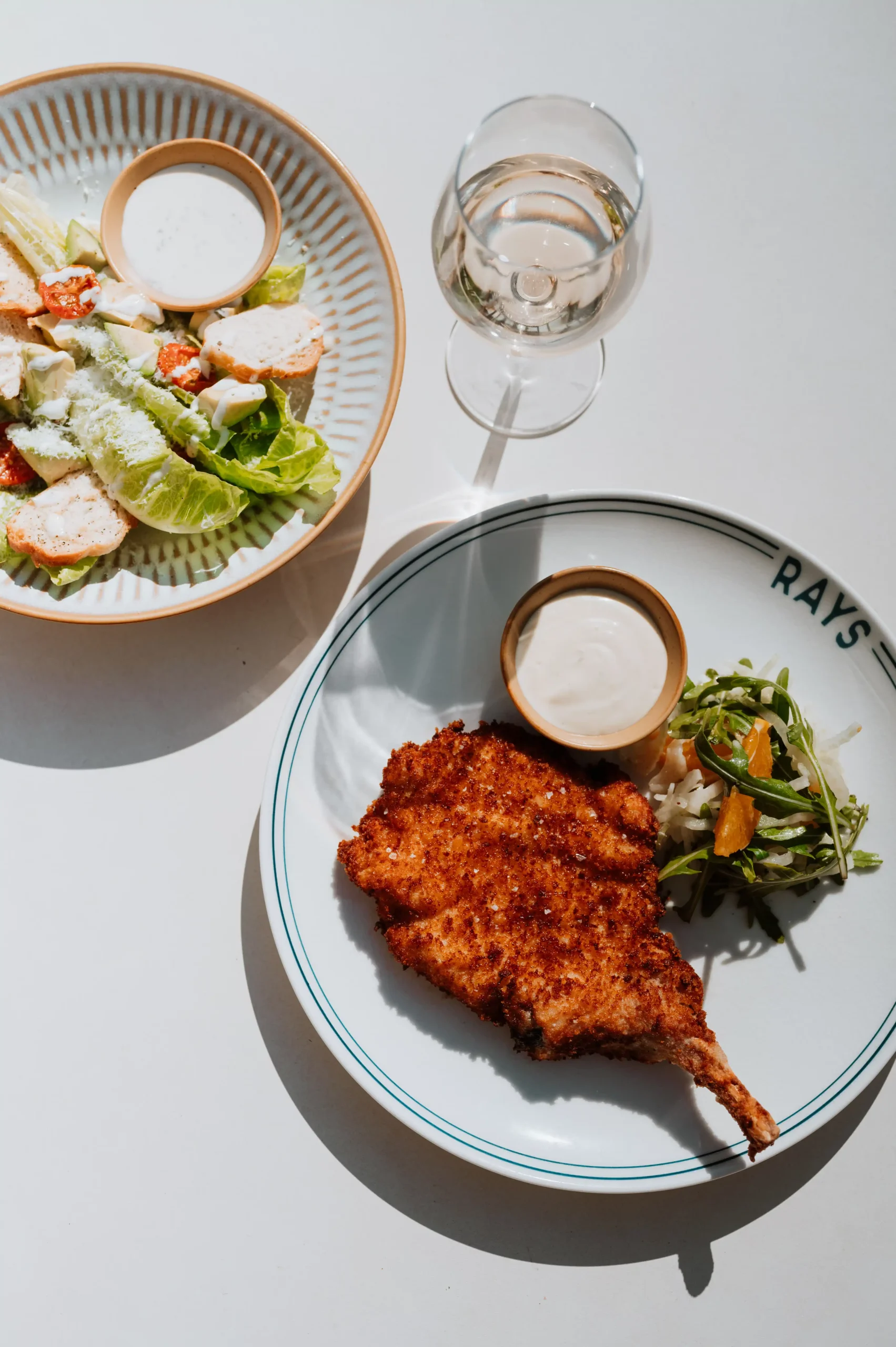 selection of dishes from Rays with wine in the sunshine