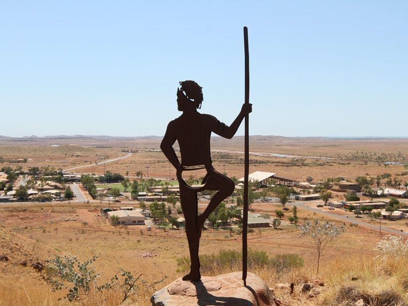 The view of the Port Hedland from the Mount Welcome Lookout. With an indigenous art sculpture in the foreground